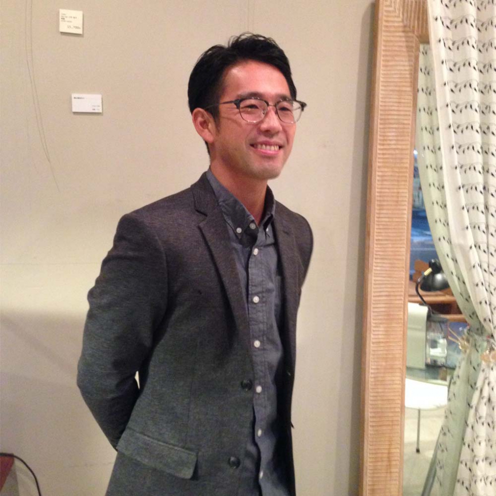 写真:男性の店長